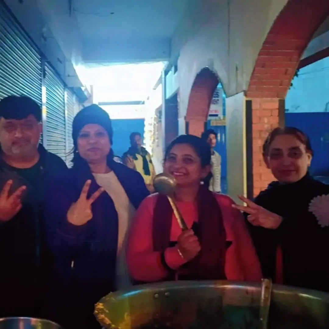 Semarpan volunteers serving food during a community activity