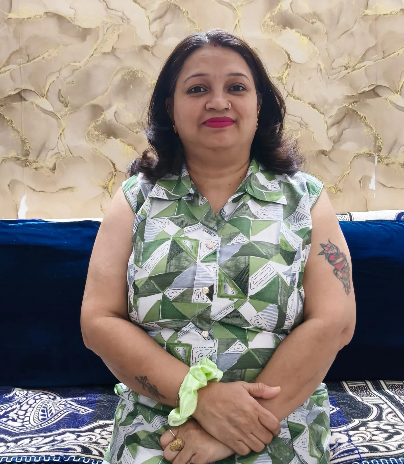 Sonia Arora seated for a portrait