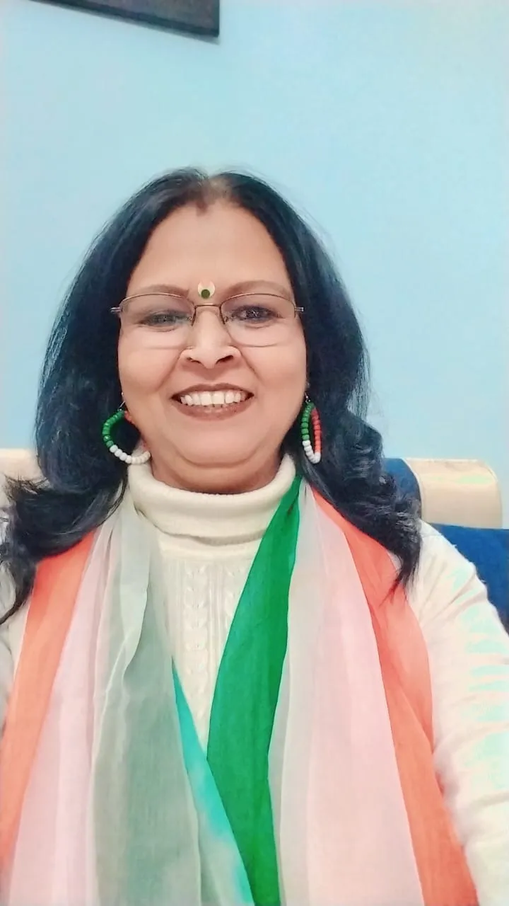 Suman Dikka smiling for a portrait